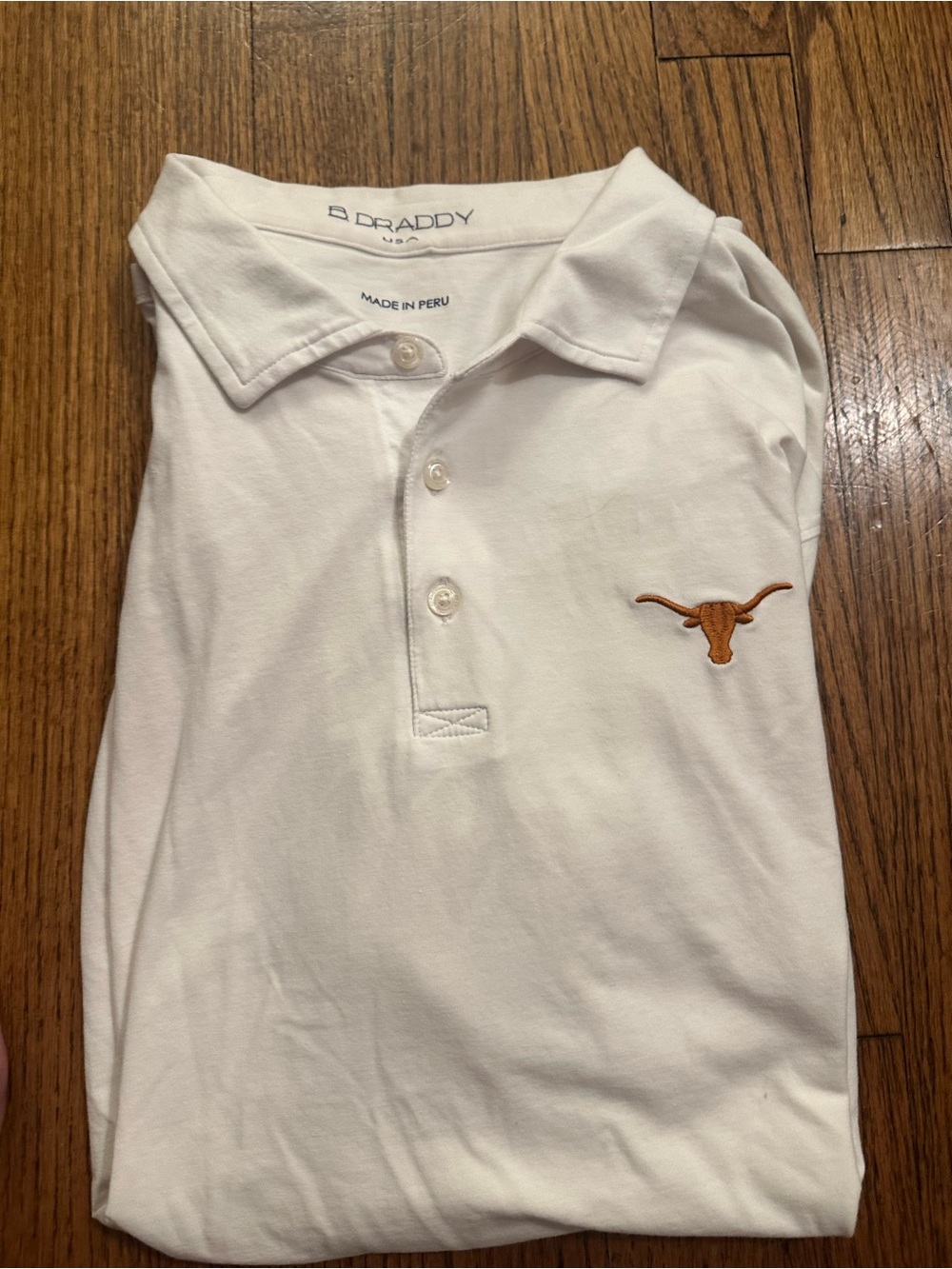 B. Draddy White Polo - UT Longhorns
